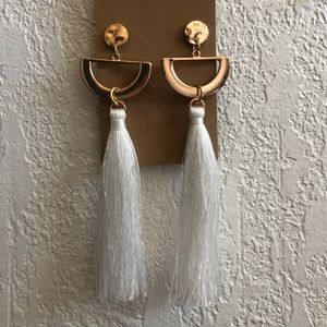 White tassel earrings